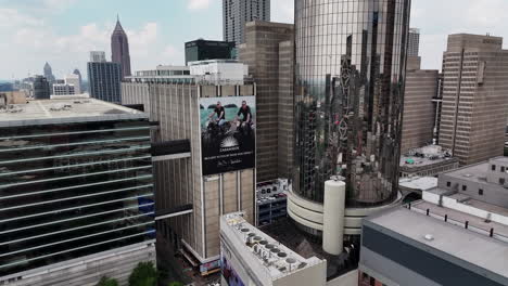 forwards fly between high rise downtown buildings