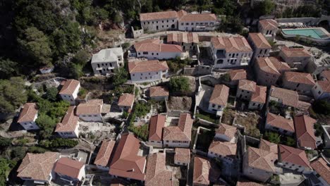 drone video of previous revealing shot over the village of nje muaj, spile, sen in himare, on the albanian coast, lash8