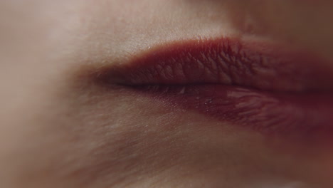 mouth of girl, conflicted movement, red lips in closeup