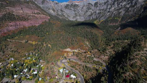 Aerial-View-of-Ouray,-Colorado-USA-and-San-Juan-Mountains-Hills-on-Sunny-Autumn-Day