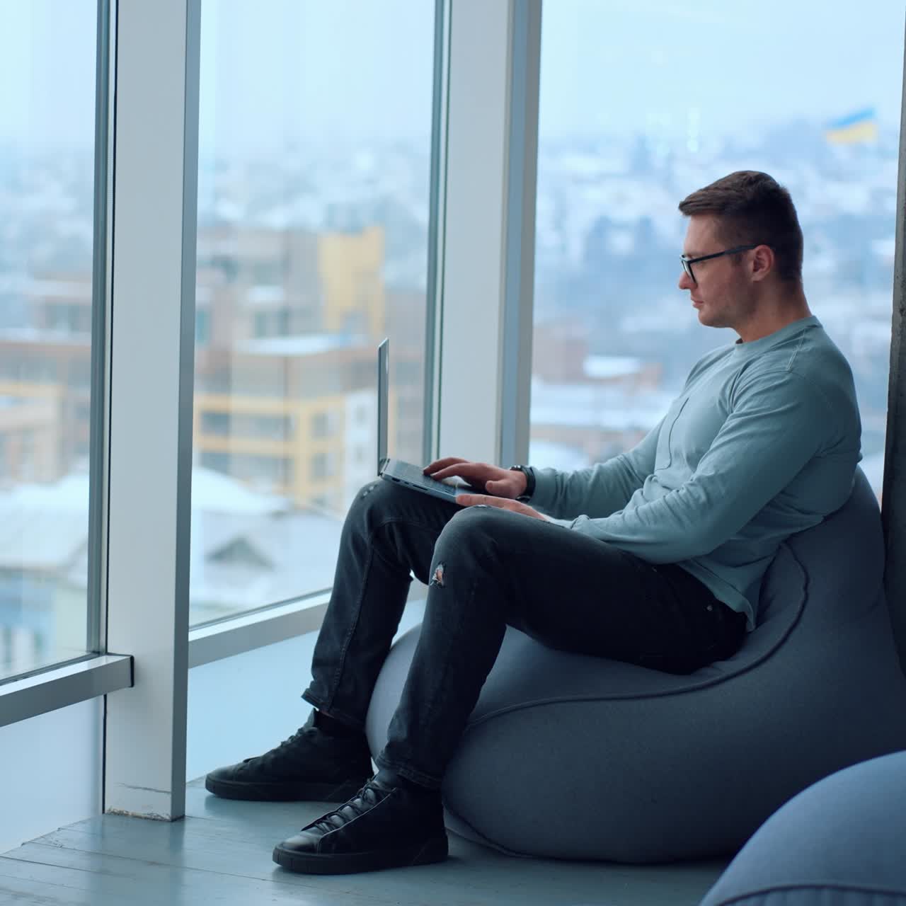 Professional businessman typing on computer. Young entrepreneur working with laptop