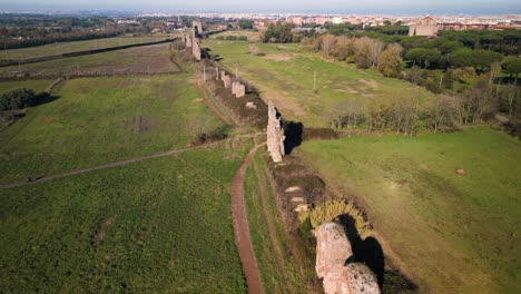 ruins of ancient roman aqueduct used to transport water to rome, italy