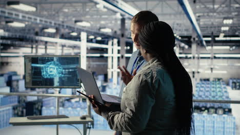technicians working together in server room, optimizing deep learning ai systems