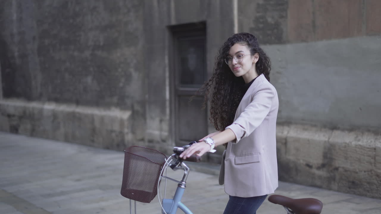 Young Woman on a Bicycle in the City