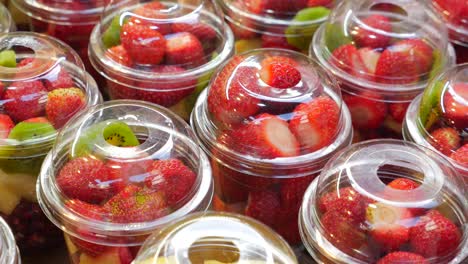 fresh fruit salad in plastic cups