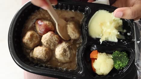 meal prep with meatballs, mashed potatoes, and vegetables