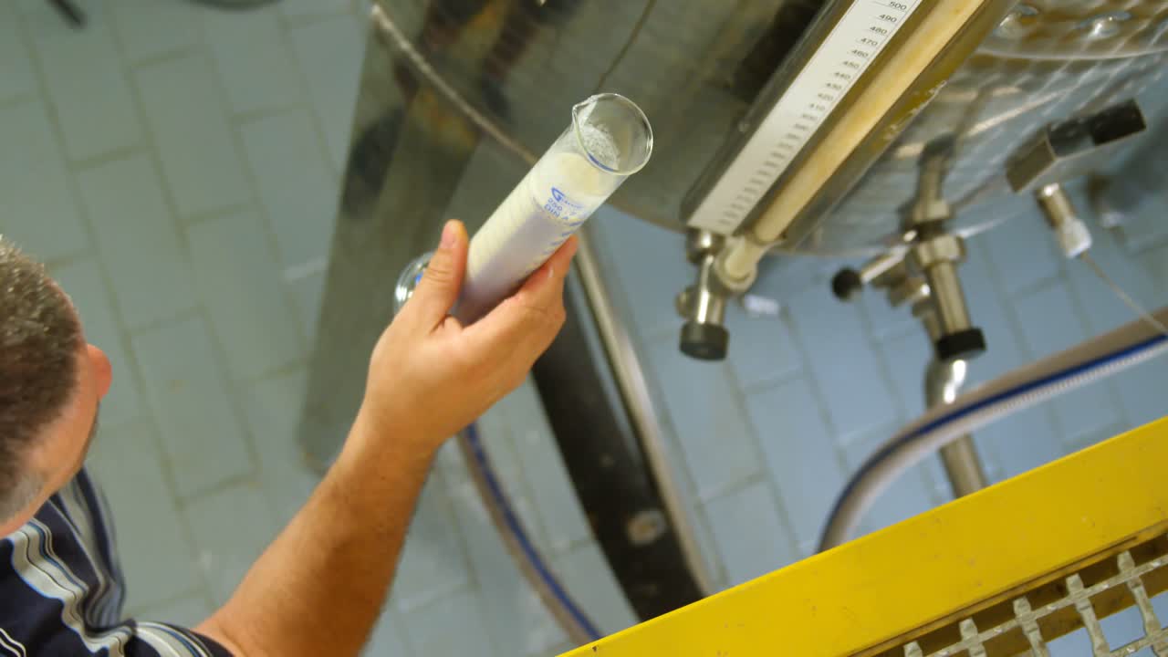 Male worker working in factory 4k