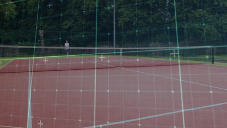 man standing behind tennis net on red clay court, showcasing sports technology grid overlay