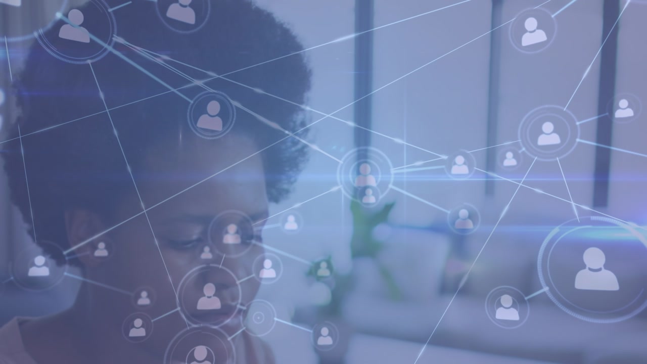 Animation of connections with digital icons over african american businesswoman in office