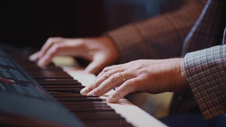 Close-up of a Man Playing the Piano