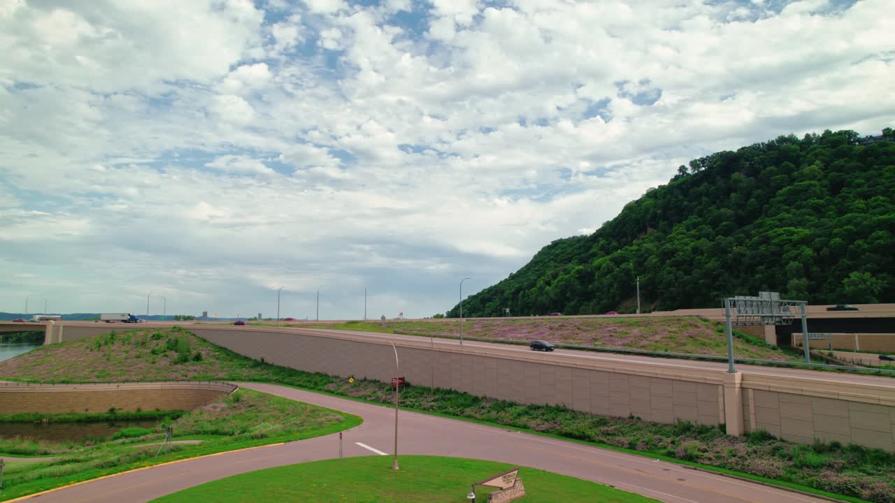 Scenic Highway View with Hillside and Bridge