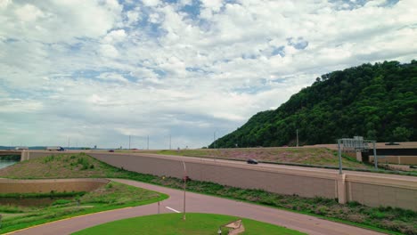 scenic highway view with hillside and bridge