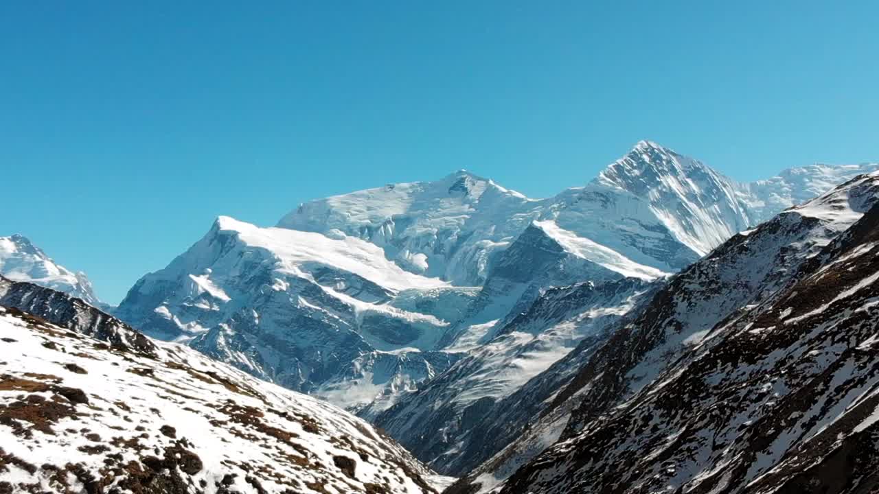 Aerial slider shot of Mount Annapurna three and Ganapurna Himalayas Mountain from Manang Valley, Nepal.
