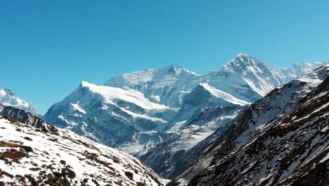 aerial slider shot of mount annapurna three and ganapurna himalayas mountain from manang valley, nepal.