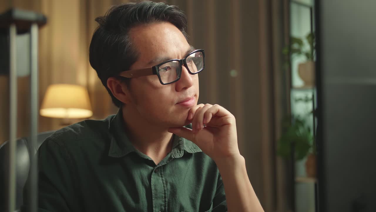 Close Up Asian Man Thinking While Works On Personal Computer And 3D Printer In Home Office, He Works At Night