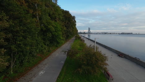 Aerial-Dolly-Over-Esplanade-With-Trees-In-Seaside-Boulevard-Of-Gdynia