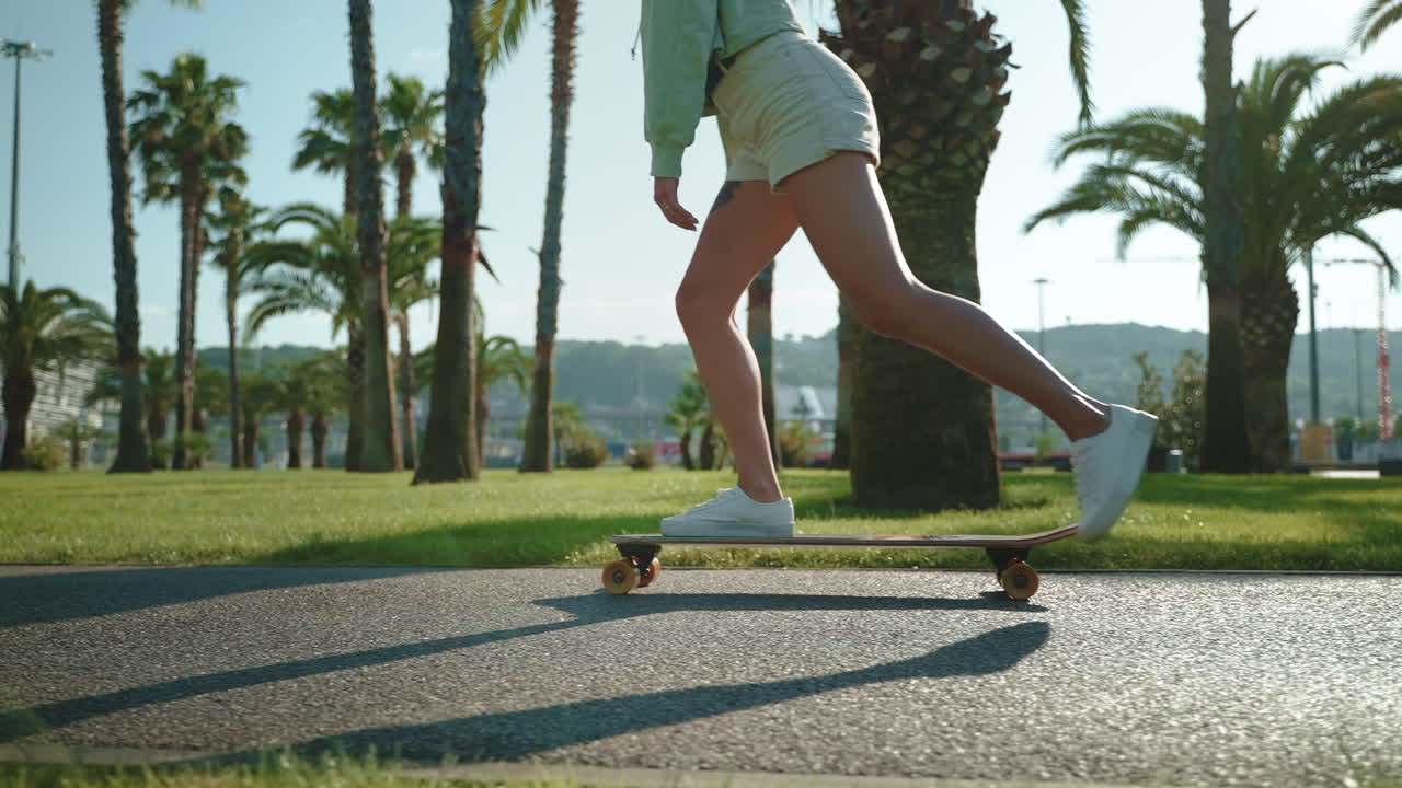 Woman Skateboarding in a Park