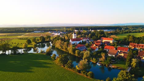 stunning aerial 4k drone footage of kostanjevica na krki in the golden sunset light