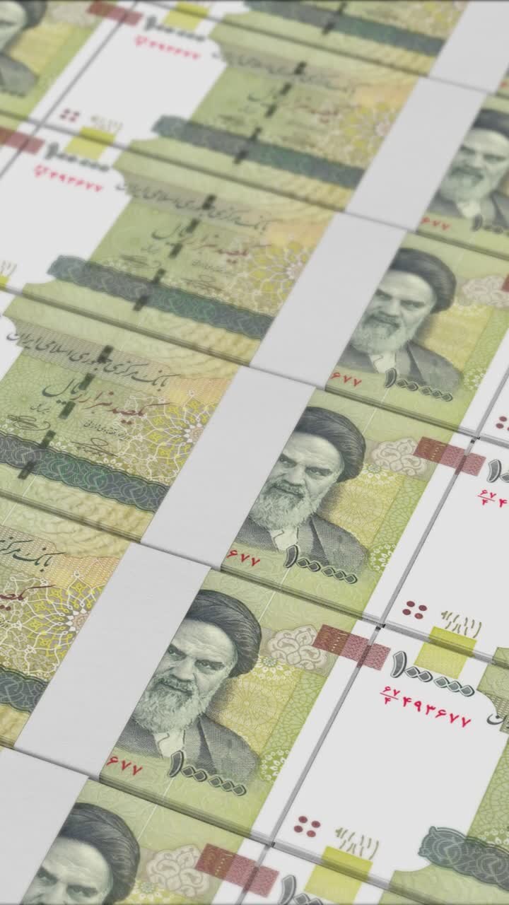 Vertical video of 100000 IRANIAN RIAL banknotes printed by a money press