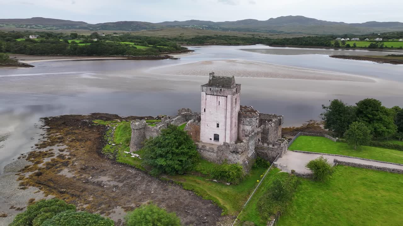 Aerial overview of Doe Castle on shore. Donegal County, Ireland. Sightseeing