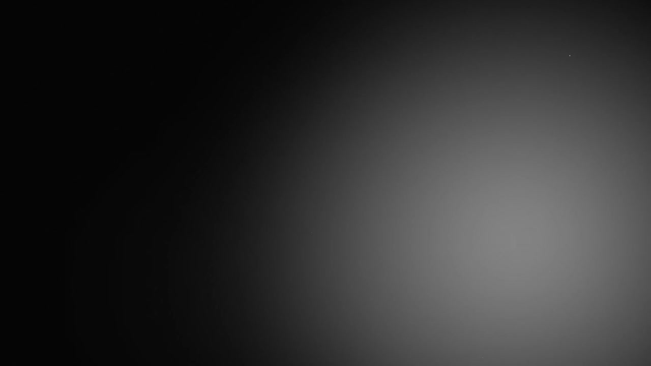 Abstract Background with Floating Dust Particles in Dark Atmosphere