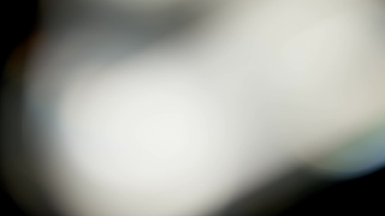 Multicolored light leaks footage on black background, lens flare leak burst overlays transitions