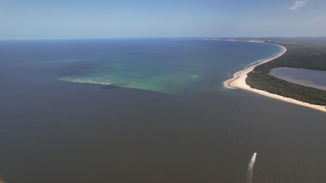 Campground And Sandy Beach Of Inskip Peninsula In Queensland, Australia. aerial shot