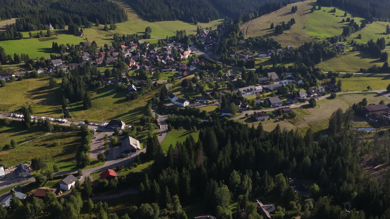 Falkau is a small, picturesque climatic health resort located at over 1000 meters at the foot of the Feldberg mountain in the Black Forest (Schwarzwald), Germany. aerial drone video