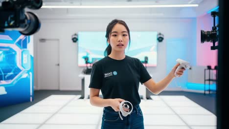 a focused young woman engaged in a high-tech environment, preparing to use advanced controllers in an immersive digital space. the modern setup enhances her concentration and passion