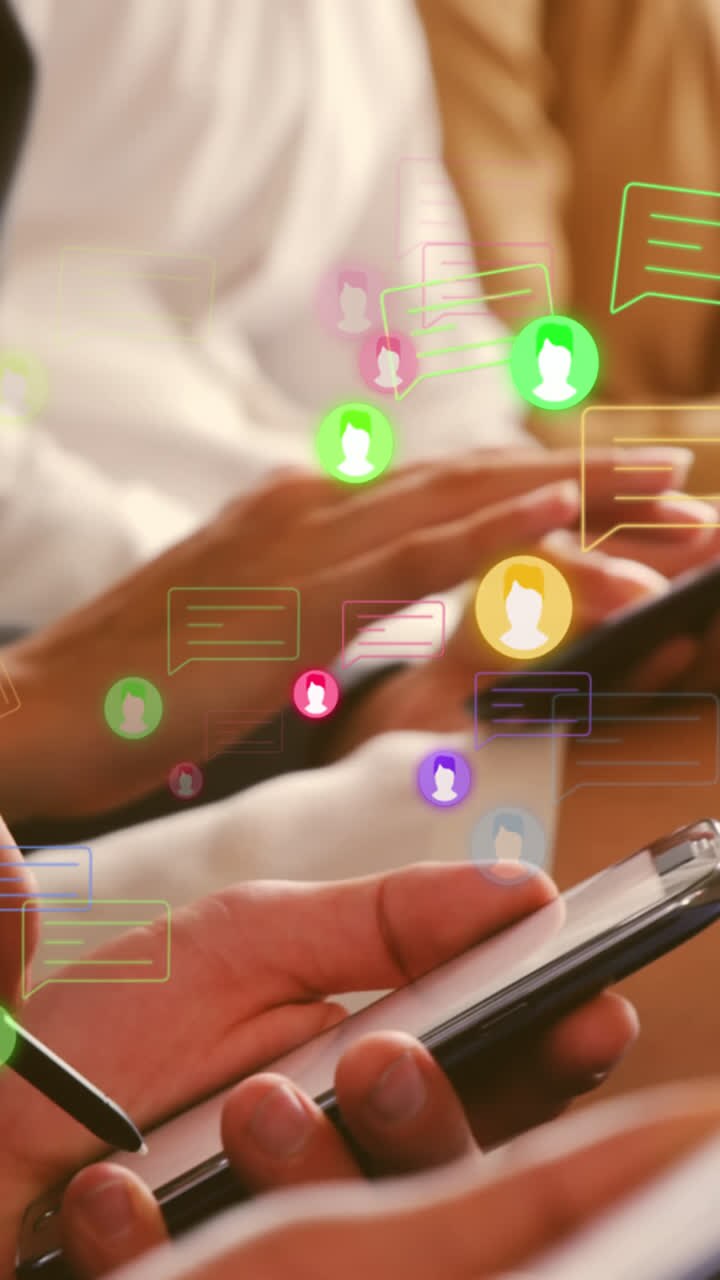 Animation of neworks of connections with icons over biracial people using smartphones