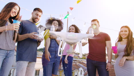 friends celebrating with a drone on