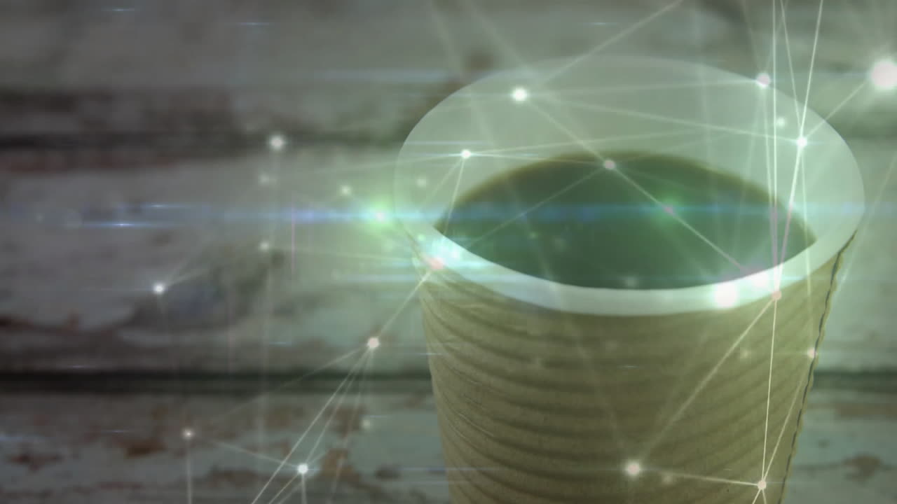 Corrugated cup holding dark brew on wooden table, showing glowing network overlay, casting streaks