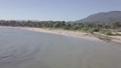 tropical island sandy beach mountains