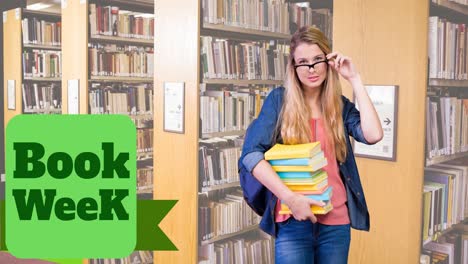 animation of book week text over caucasian female student holding books in library