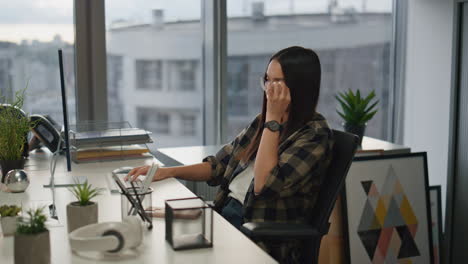 focused woman texting keyboard at office closeup. business team having deadline