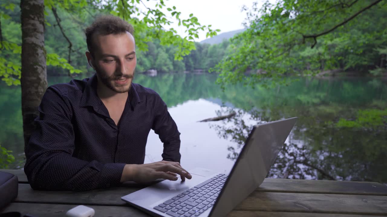 Working with a laptop in nature.