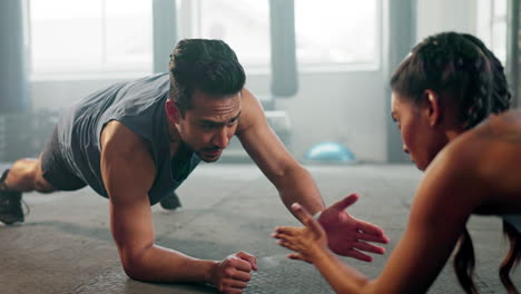 Teamwork,-plank-or-personal-trainer-at-gym