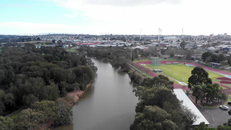 aerial over barwon river and athletics track and field, geelong australia