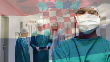 Animation-Der-Flagge-Kroatiens,-Die-über-Chirurgen-Im-Operationssaal-Weht