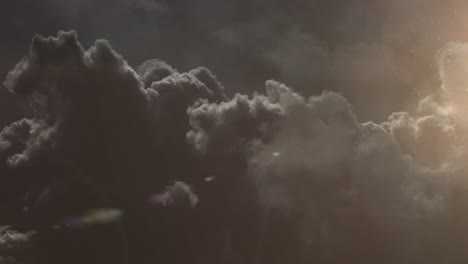 dark clouds accompanied by sunlight