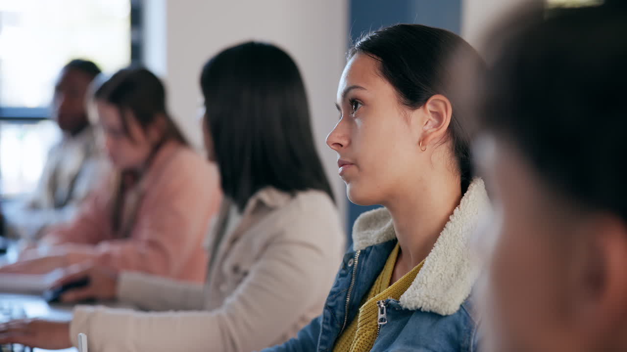 Diverse group of students attentively learning in a classroom