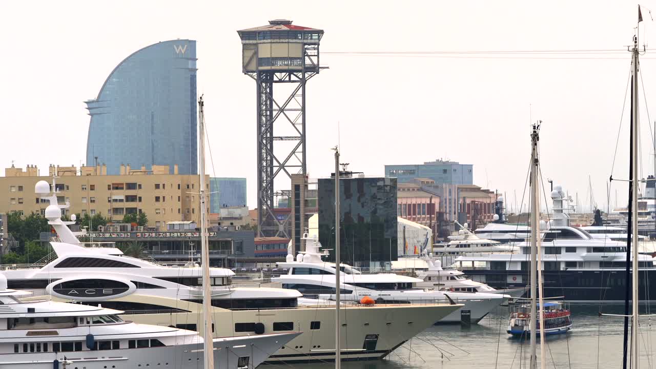 Aerial drone view of boats docked in the Port Vell in Barcelona, Spain