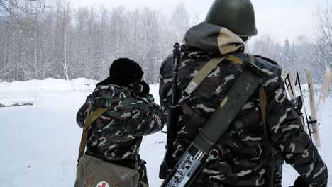 russian soldiers in winter forest