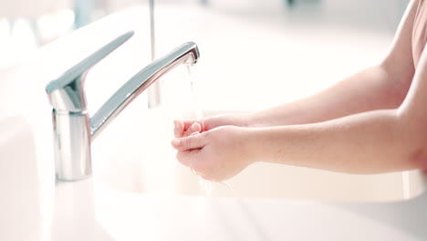 Water,-soap-and-a-person-washing-hands