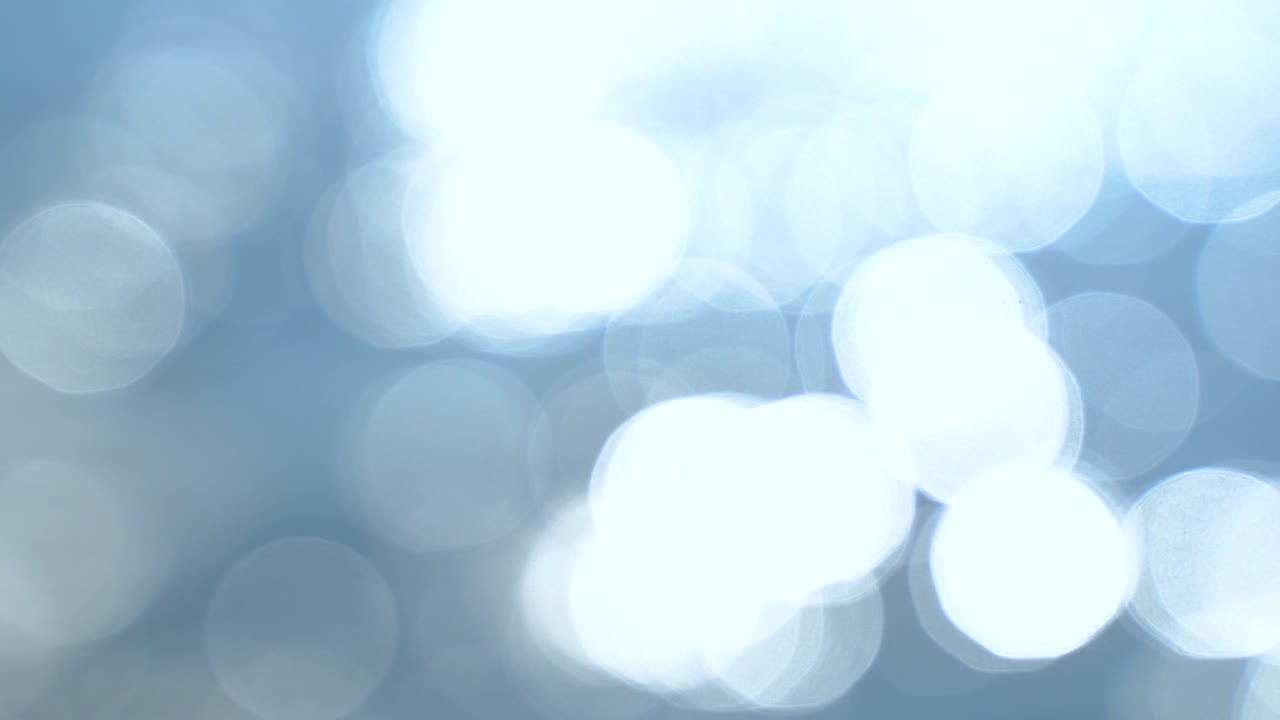 추상적인 보케 (bokeh) 빛의 배경, 바다의 파도, 밝은 반이는 배경