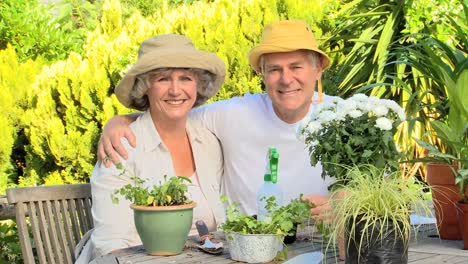 mature couple posing for a photograph