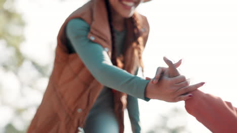 two women helping each other