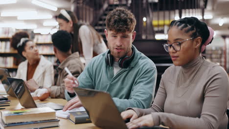 students collaborating in a library