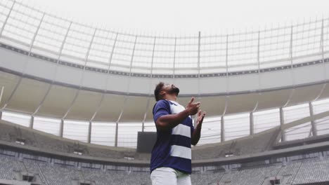 male rugby player playing rugby match in stadium 4k