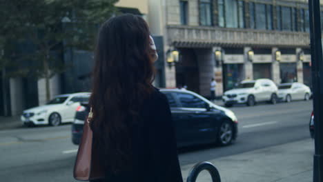 Pretty-woman-stroll-on-avenue-closeup.-Attractive-asian-girl-walking-on-weekend.